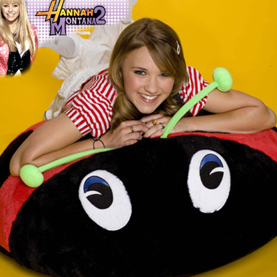 illustration of Giant Plush Bean Bag characters, shown here with Miley Cyrus, better known as Hannah Montana in Tiger Beat magazine.